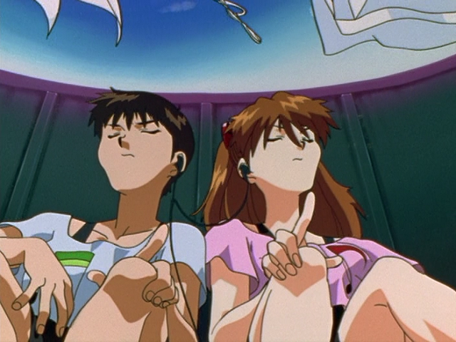 Shinji Ikari and Asuka Sohryu Langley Soryu groove out on a shared set of headphones.