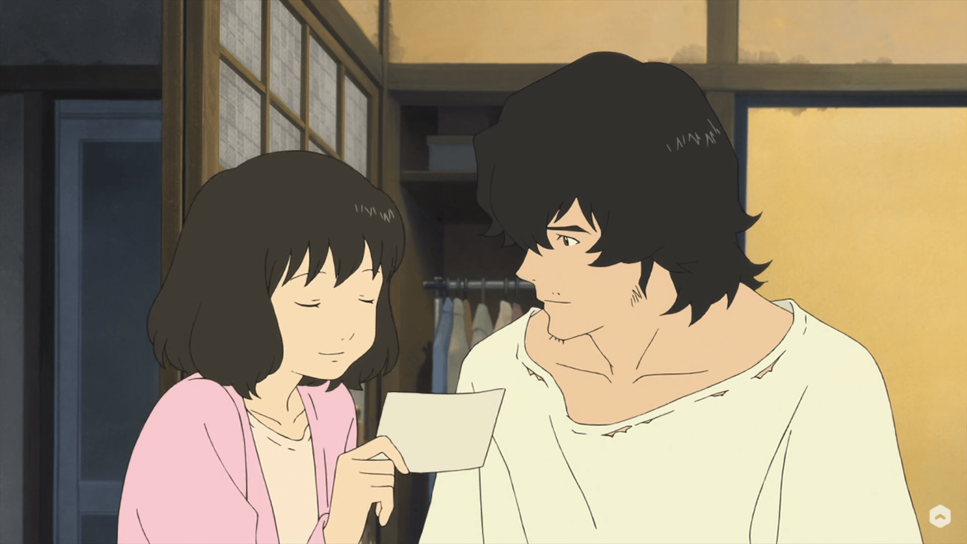 Hana shares a moment with her partner in Wolf Children