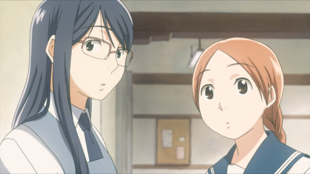 Fumi Manjome and Akira Okudaira share a quiet moment in class in a scene from the Sweet Blue Flowers TV anime.