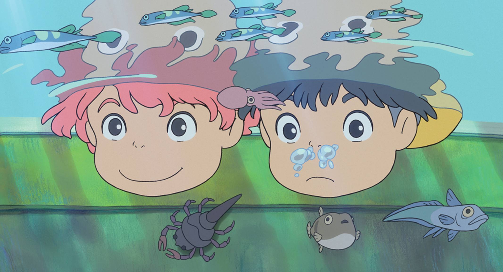 Ponyo and Sosuke dip their faces underwater to look at fish and other tiny marine creatures in a scene from the 2008 theatrical anime film, Ponyo.